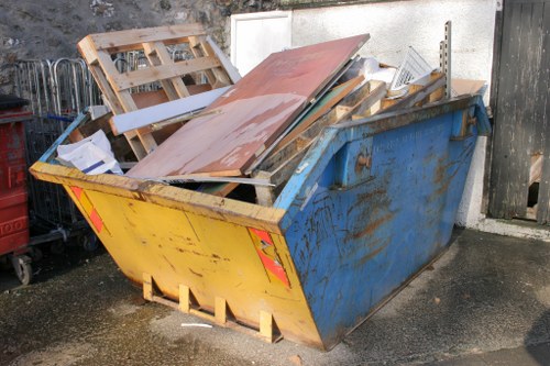 Home clearance team removing furniture